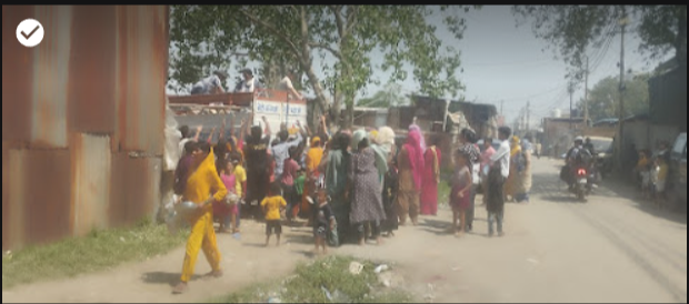 Ration distribution drive gathering for waste picker families in Shahdara Delhi